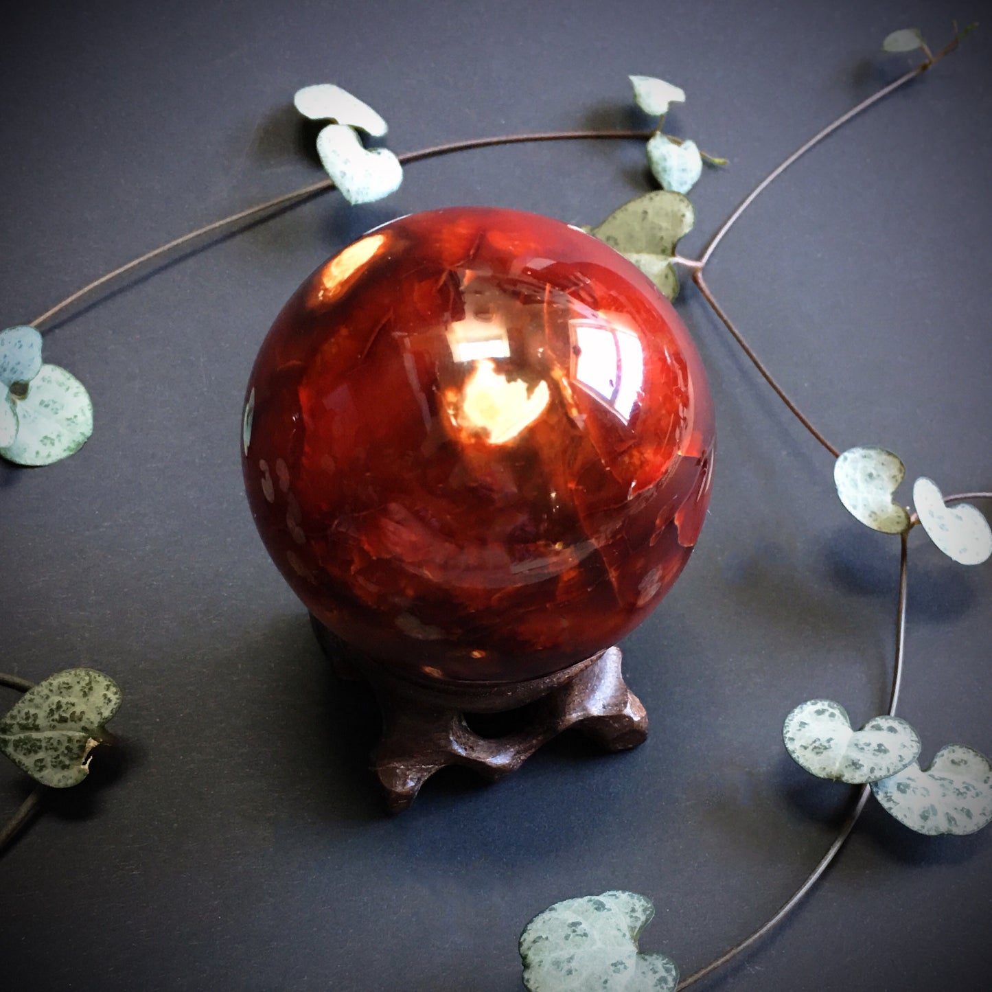 Carnelian Agate Ball with Carved Wooden stand