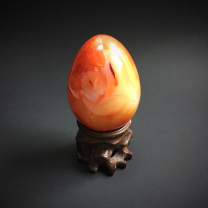 Carnelian Agate Crystal Dragon Egg with Wooden Stand