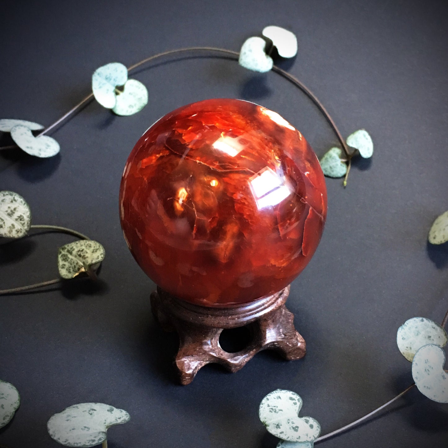 Carnelian Agate Ball with Carved Wooden stand