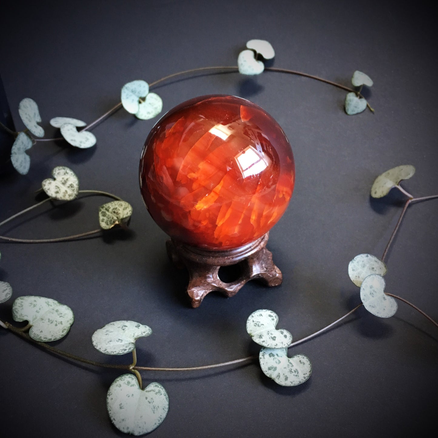 Carnelian Agate Ball with Carved Wooden stand